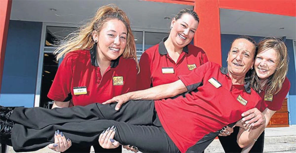 Perfect pick-me-up: Christina Grogan with new colleagues Angela Ludlow, Keetah Gallagher and Celeste Monaghan. Picture: Greg Totman