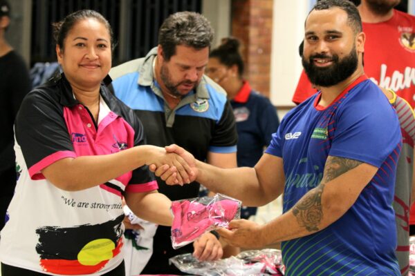 Players receiving their jerseys