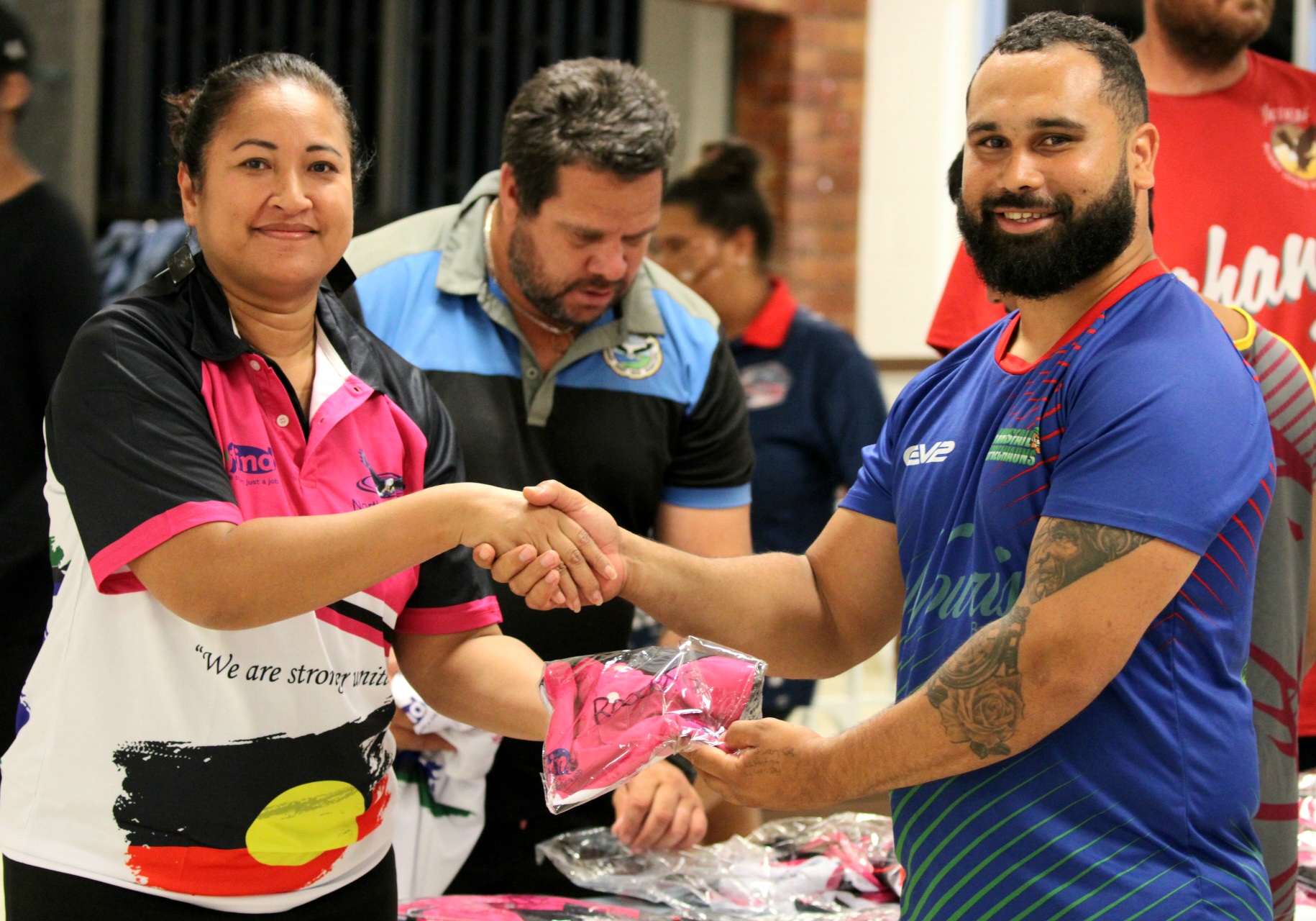 Players receiving their jerseys