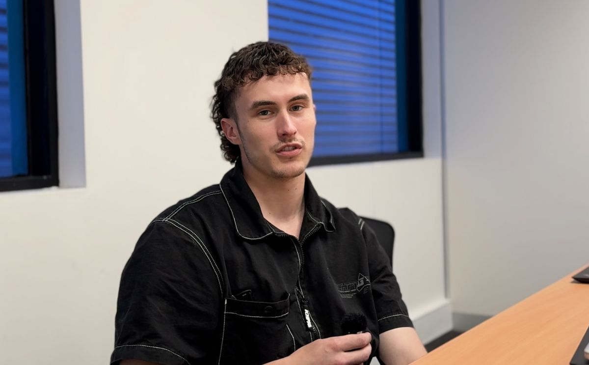 Tom sitting in AKG office