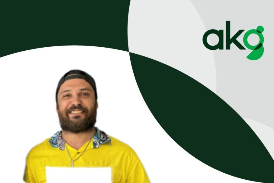 A smiling worker holding a clipboard