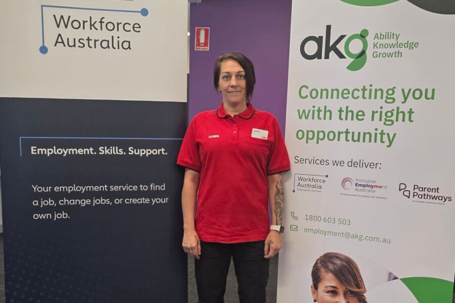 Tenille looking happy in AKG office
